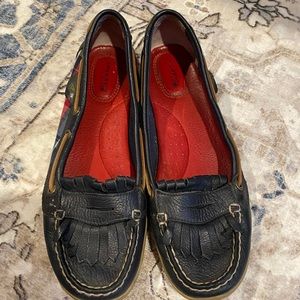 Sperrys topsiders in navy and red plaid.